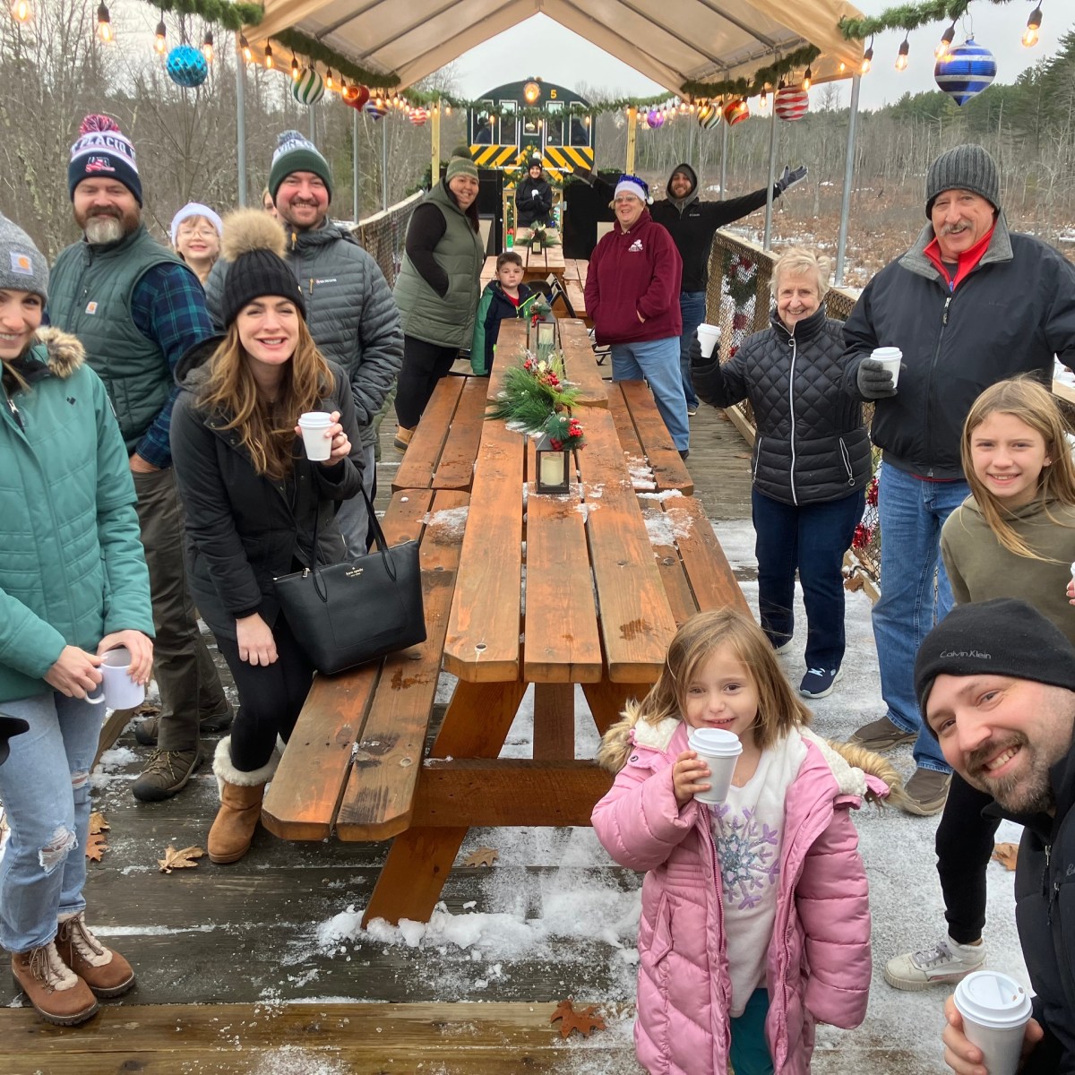 a group of people standing in front of a crowd