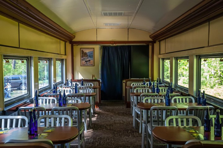 a room filled with furniture and a large window