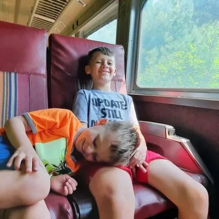 a small child sitting on a chair