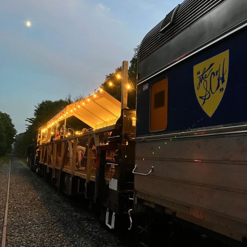 a large long train on a steel track