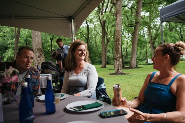 a group of people sitting at a table