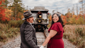 a person walking down a dirt road