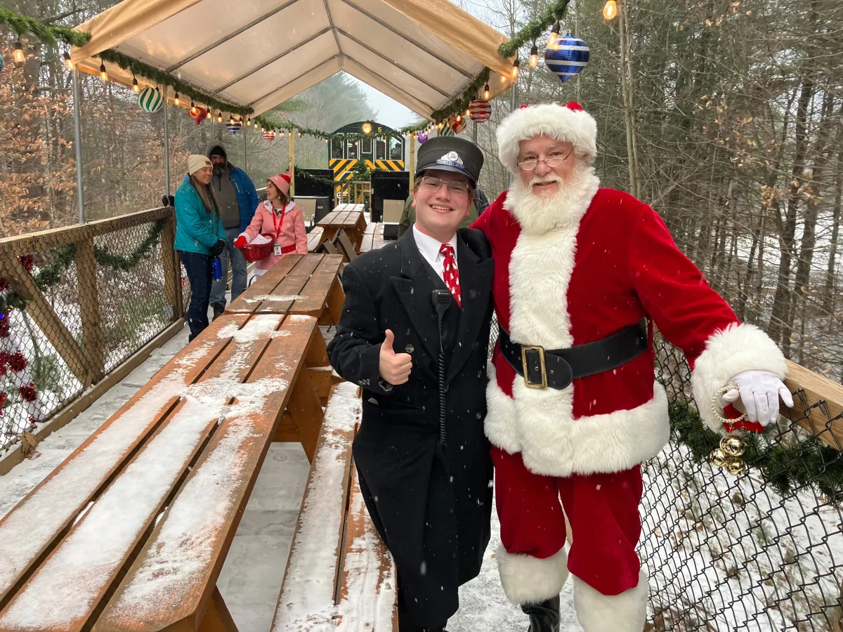 a group of people that are standing in the snow