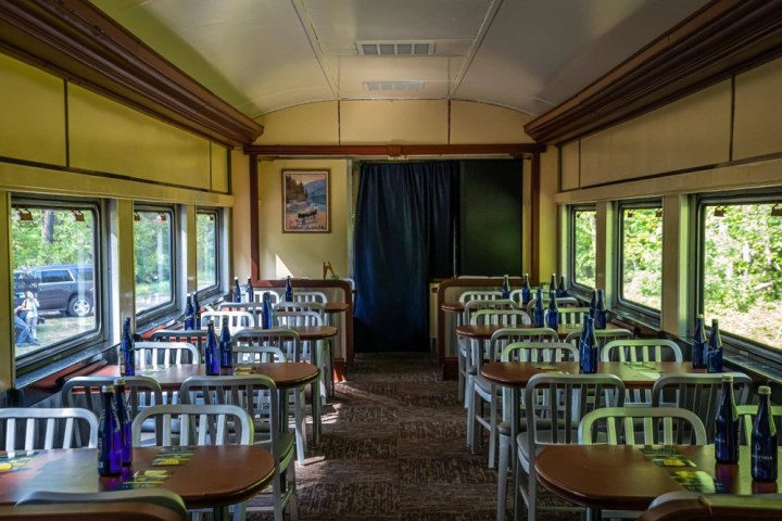 a dining room table in front of a window