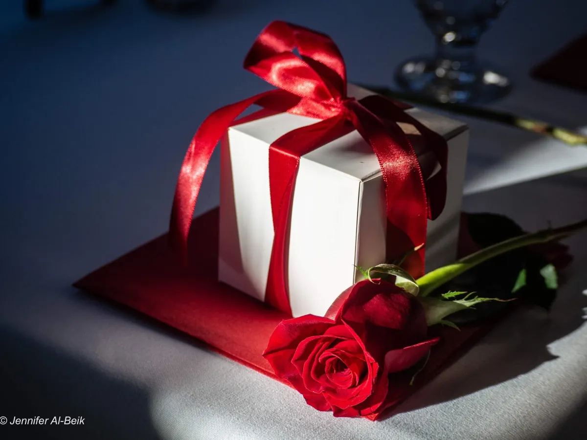 a vase of flowers sitting on a table